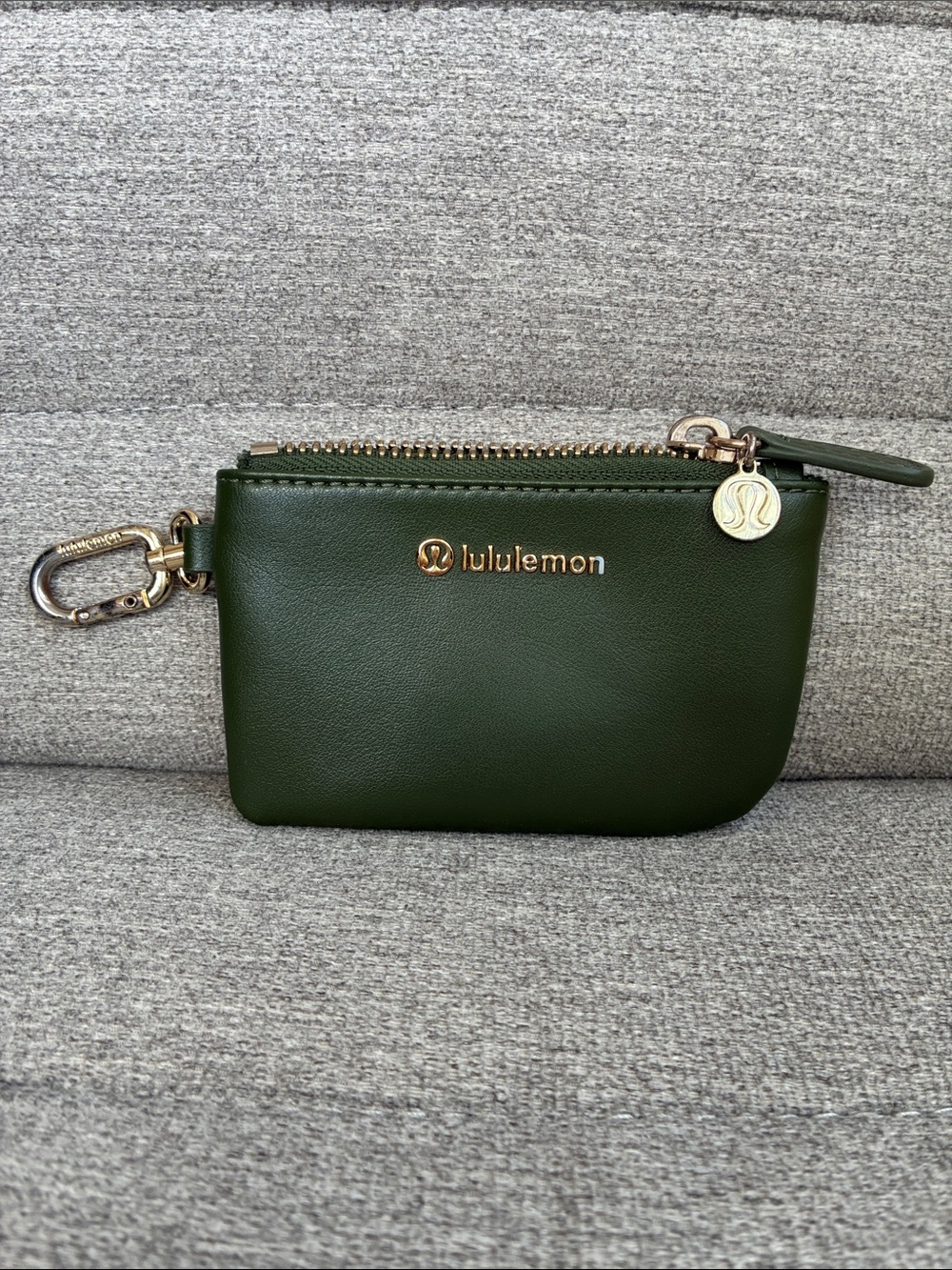 Lululemon's "Barracks Green/Gold" pouch bag